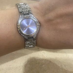 Geneva ladies watch purple face gold details